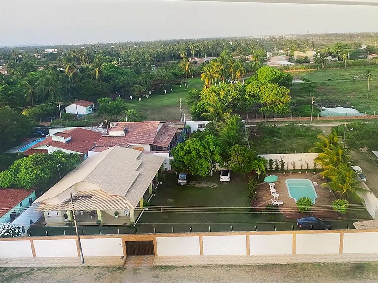 Casa de Praia com Ar, Piscina e Grande Área Verde