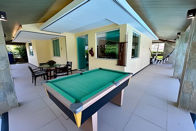 Casa 4/4 c/ AR e piscina em condomínio frente mar