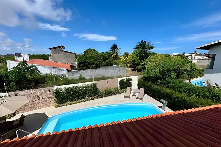 Casa 4/4 c/ AR e piscina em condomínio frente mar