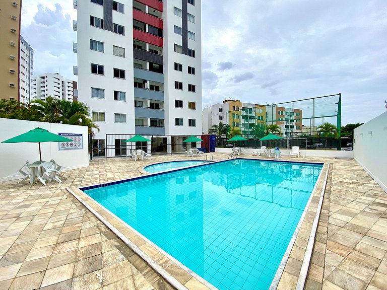 Apto em condomínio 2/4 com AR a 5min de shopping